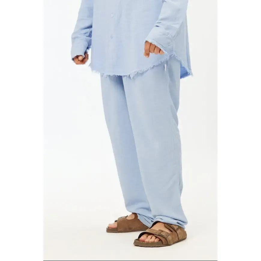 Soft Linen Set in Sky Blue, long sleeve shirt and pants, worn with brown sandals