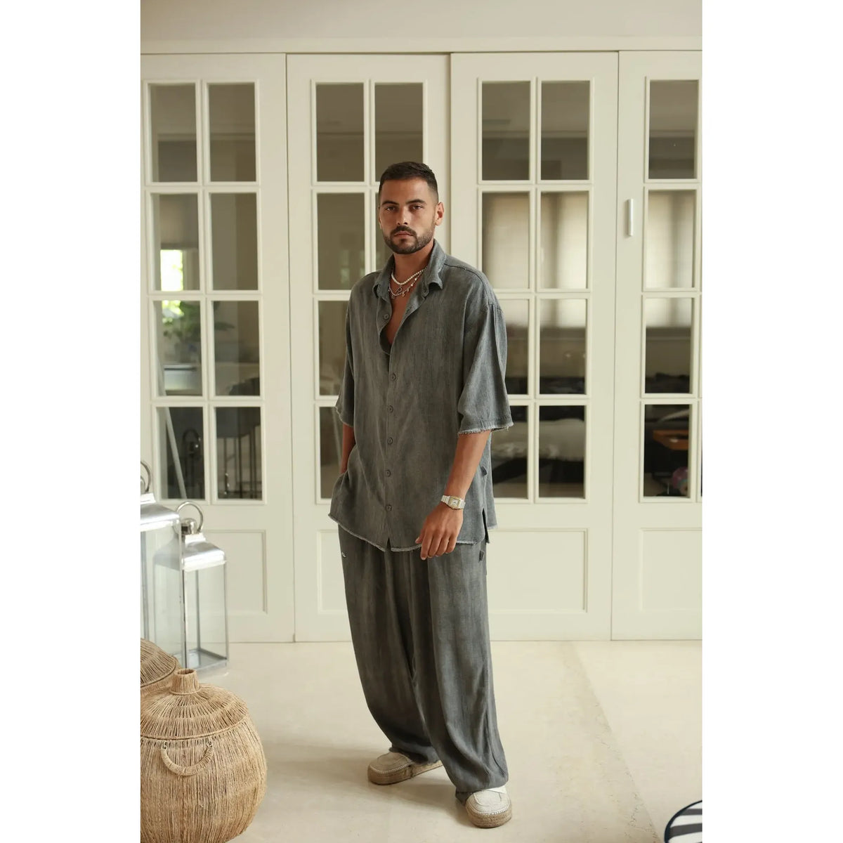 Man wearing Pure Grey Oversized Soft Linen Pants and matching shirt