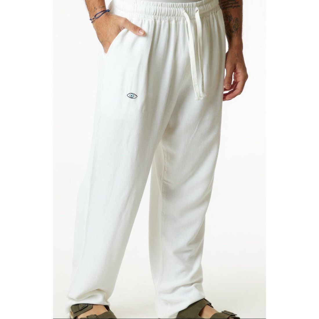 White pants with a logo on a white background
