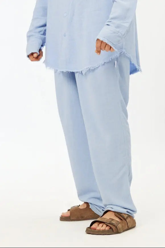 Soft Linen Set in Sky Blue, long sleeve shirt and pants, worn with brown sandals