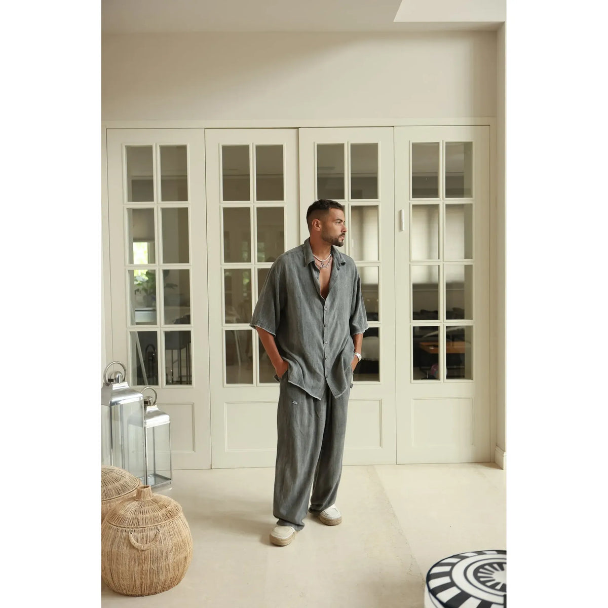 Man wearing Pure Grey Oversized Soft Linen Pants and matching shirt