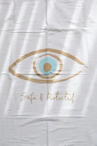 Cotton Single Elliptical Eye Blanket with a large gold and blue eye design and the words Safe & Protected