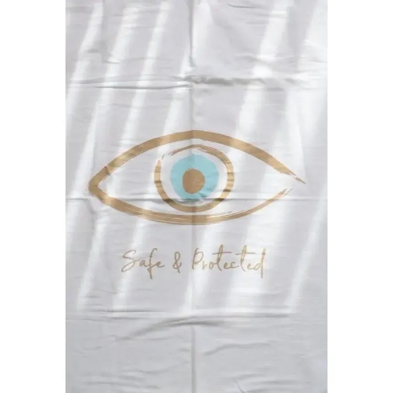Cotton Single Elliptical Eye Blanket with a large gold and blue eye design and the words Safe & Protected