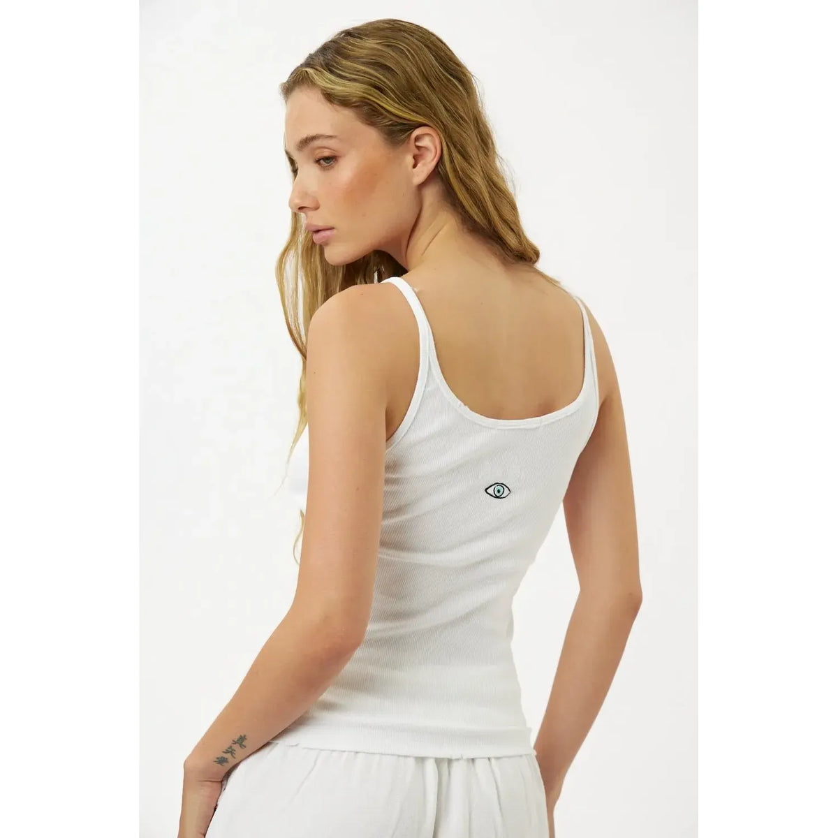 Slim Cotton Tank Top in white with a small eye graphic on the back